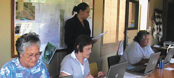 Community members learning technology