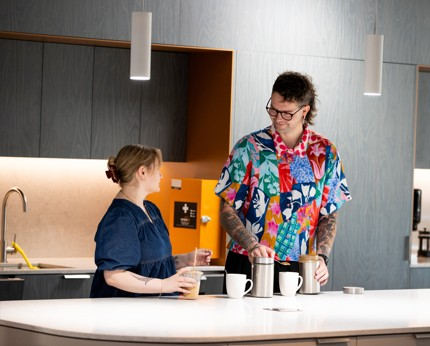 Two people in kitchen